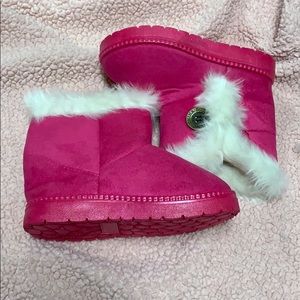 Pink and white winter boots